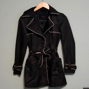 Seductions black trench coat with white trim